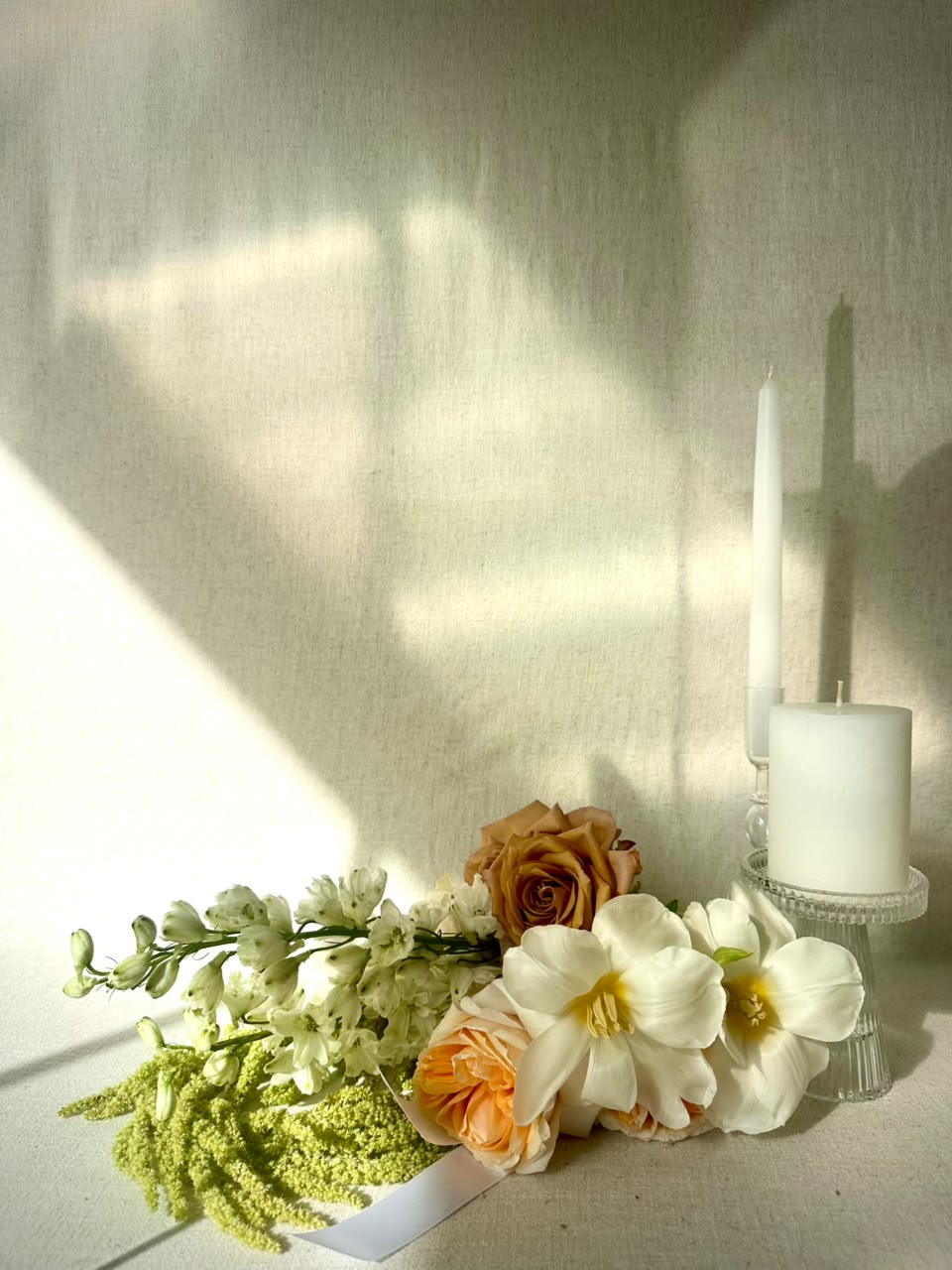 Copper roses and white orchids spilling into chartreuse trailing amaranthus